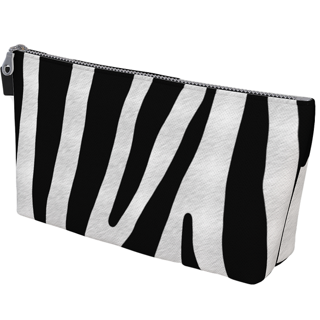 Woke Creations' make up bags have generous space to carry all of your necessities.  This bag has zebra print on one side and pony print on the other.
