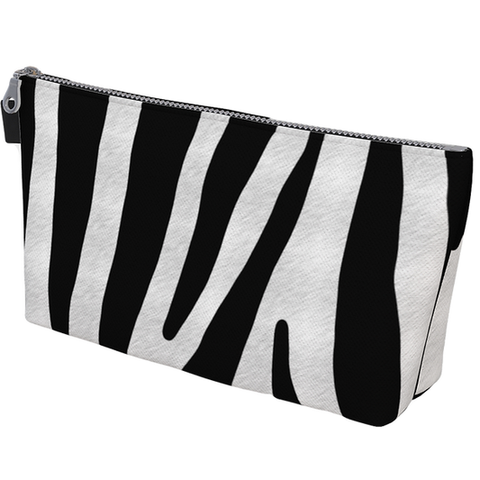 Woke Creations' make up bags have generous space to carry all of your necessities.  This bag has zebra print on one side and pony print on the other.