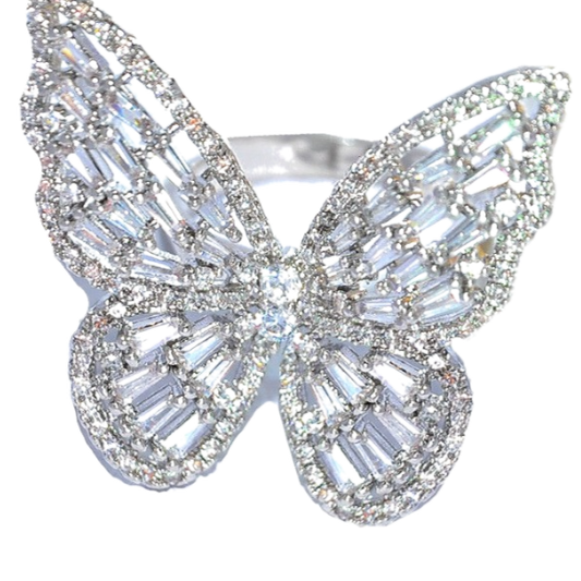 Glistening celebrity style platinum butterfly statement ring full of sparkling white cubic zirconium baguette stones.