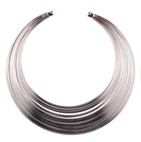 Women's silver choker with multi ring design. Metal alloy.